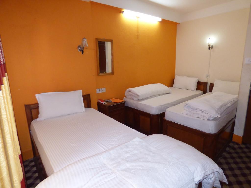 Hotel Api Catmandu Quarto foto