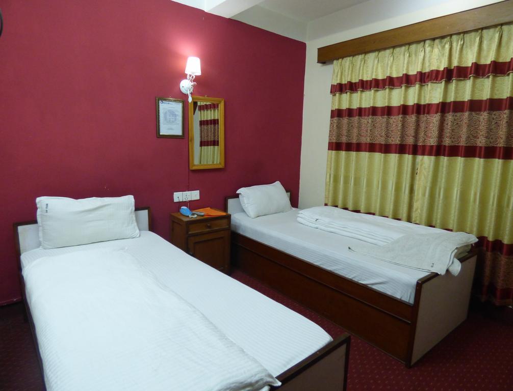 Hotel Api Catmandu Quarto foto